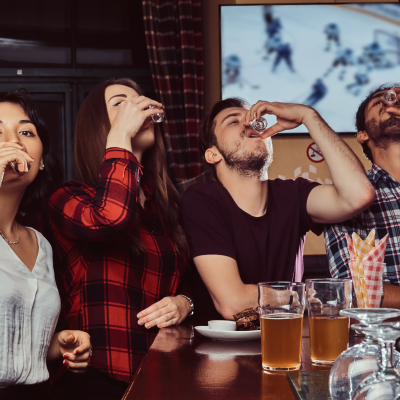 young-multiracial-friends-drinks-vodka-resting-pub-min.jpg image 1